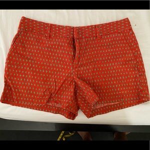 Orange shorts with tan designs